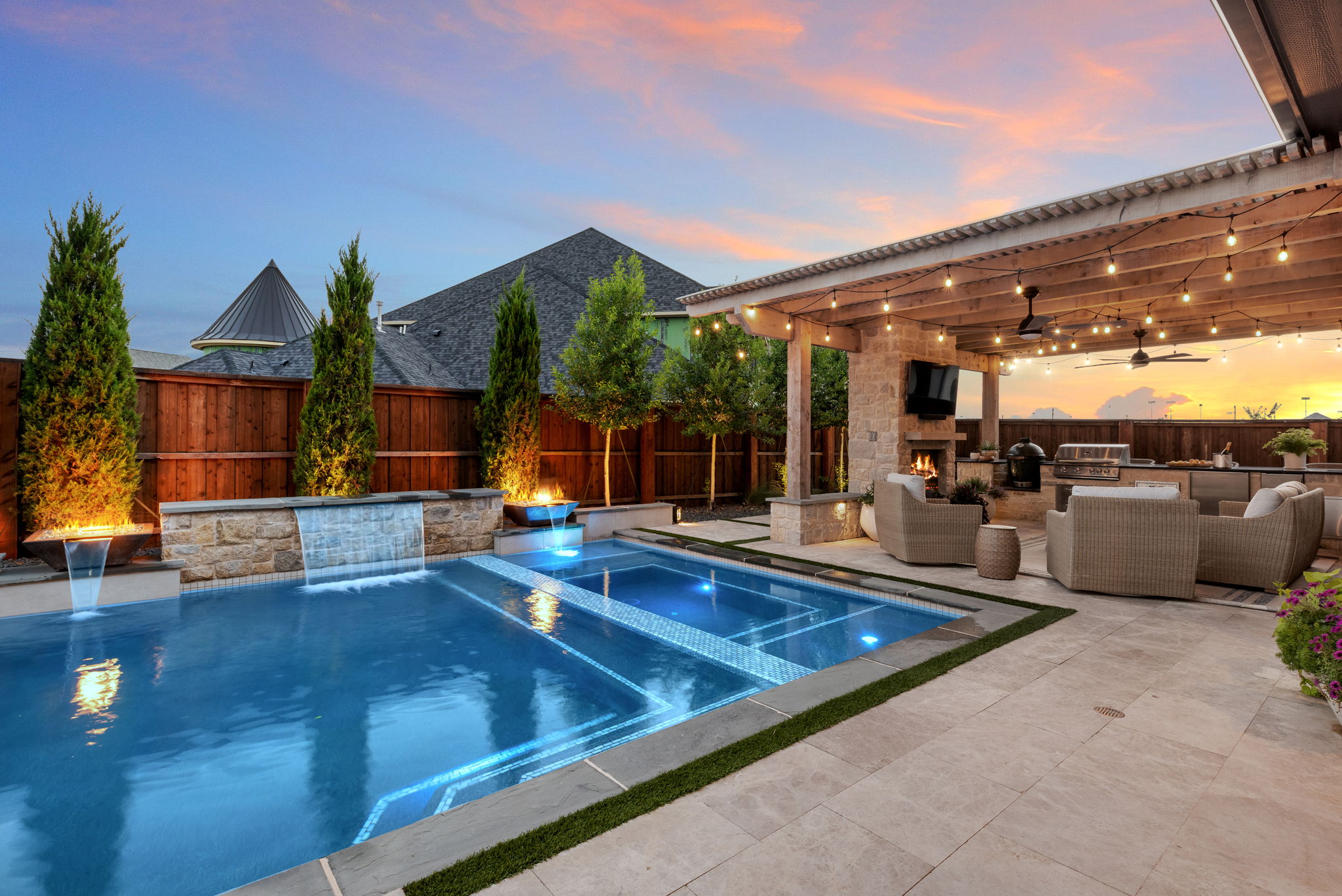 Swimming Pool and Outdoor Patio at Night